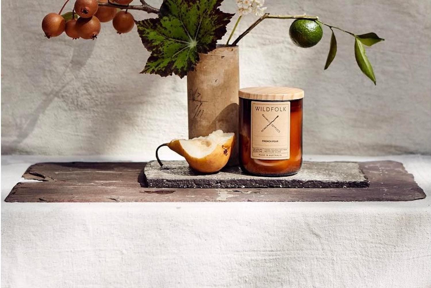 Collection of premium Australian candles in glass vessels with minimalist labels, displayed together