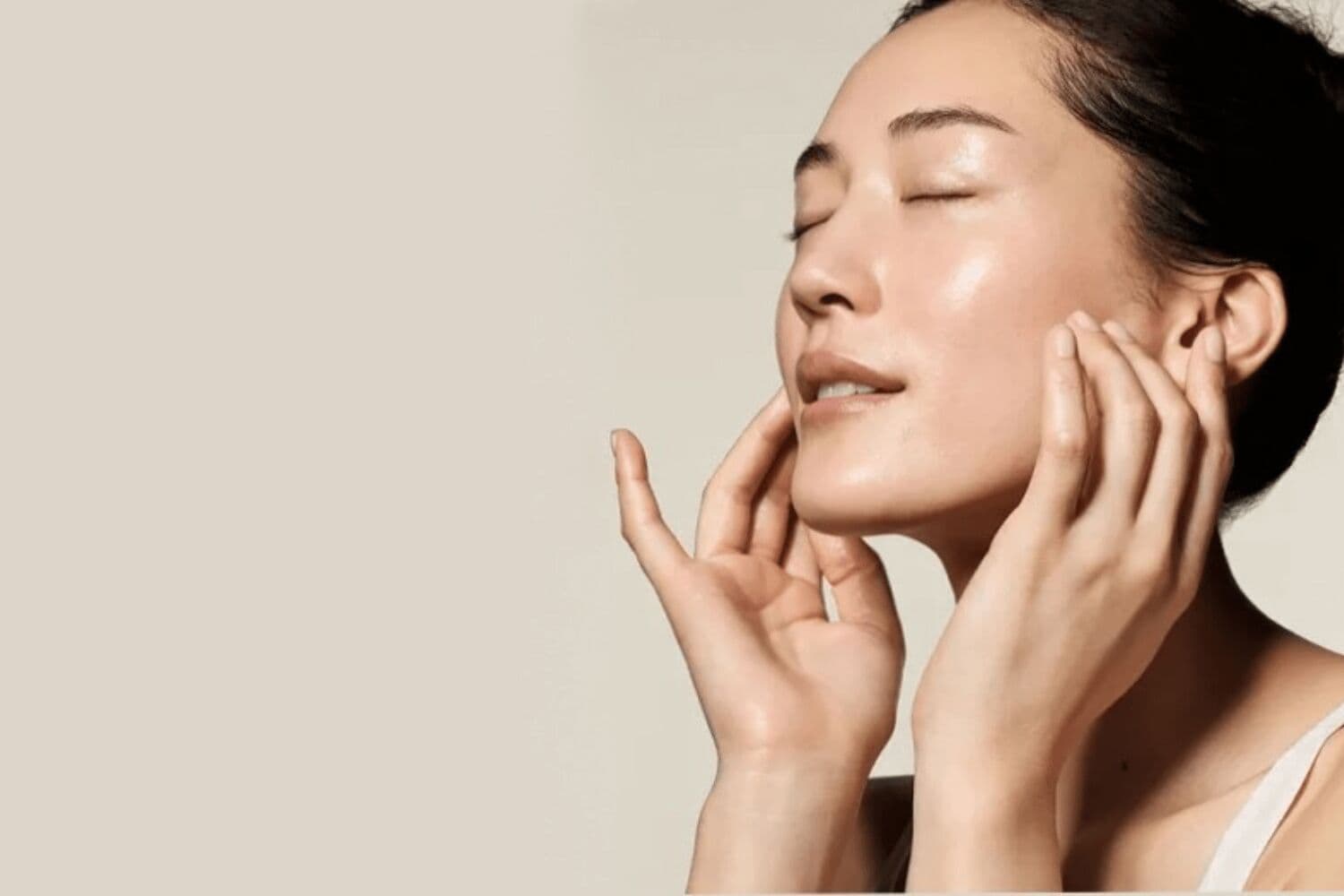 Flat lay of best Korean beauty skincare products including serums, essences and sheet masks