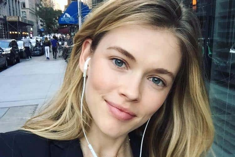 Fashion influencers and podcast hosts in stylish Parisian setting