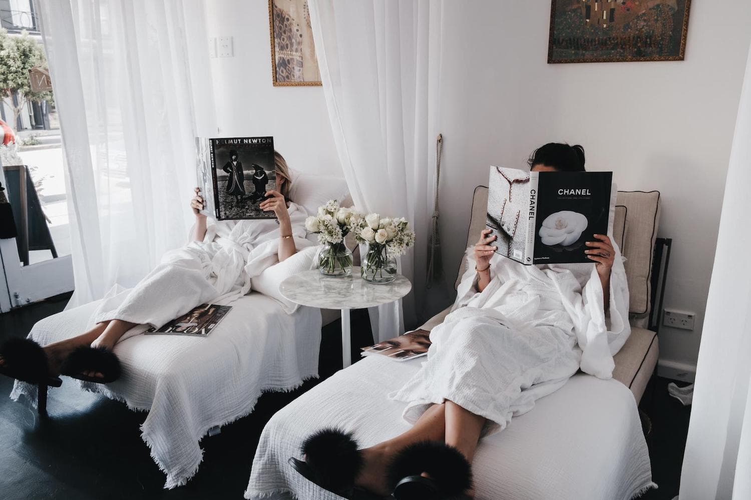 Elegant European-style beauty salon treatment room with skincare products displayed on shelves