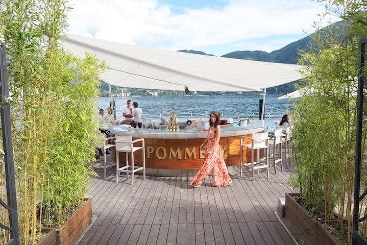 Luxury infinity pool overlooking Lake Como with mountain views at Grand Hotel Tremezzo