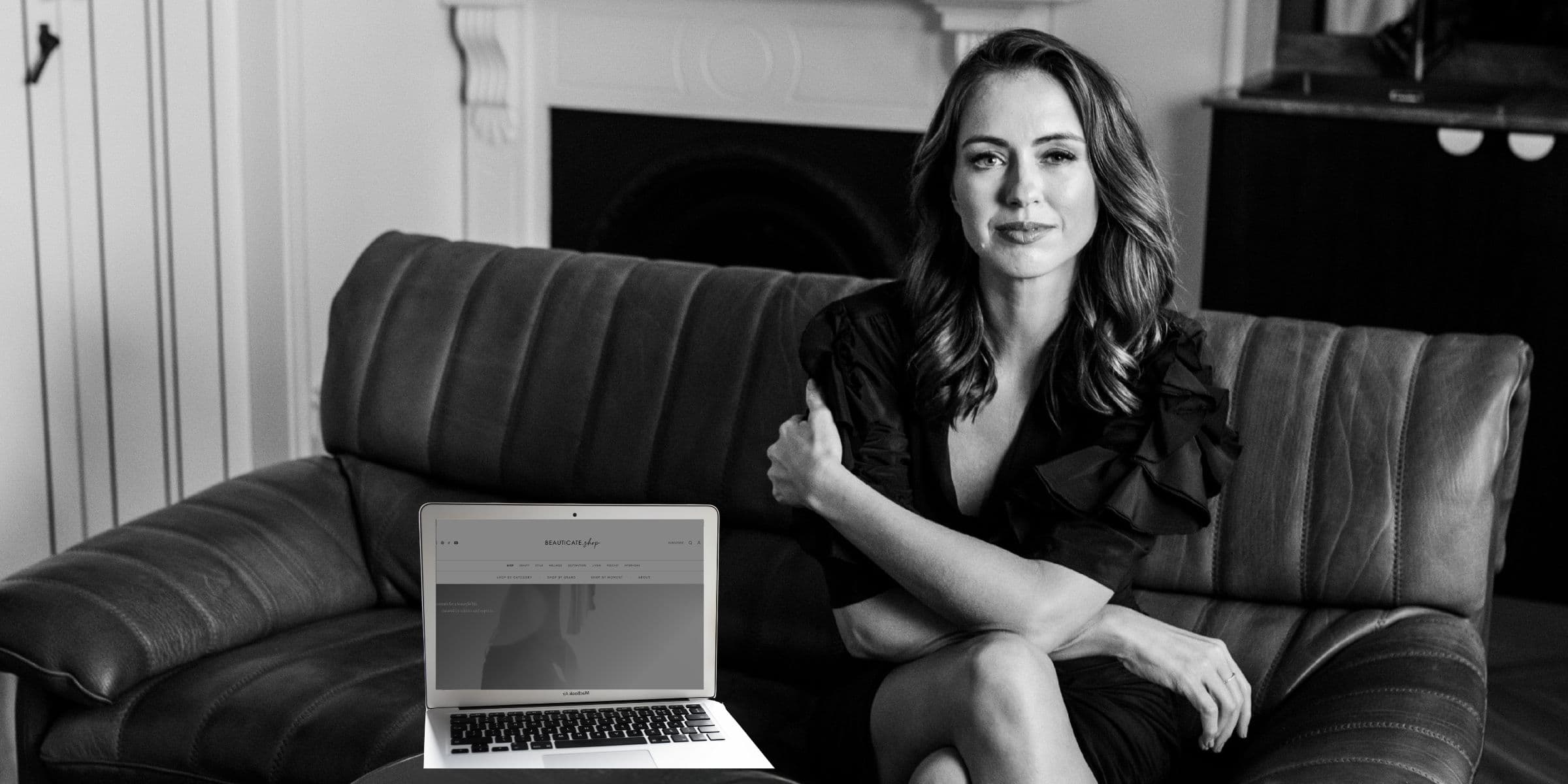 Sigourney Cantelo on a leather couch
