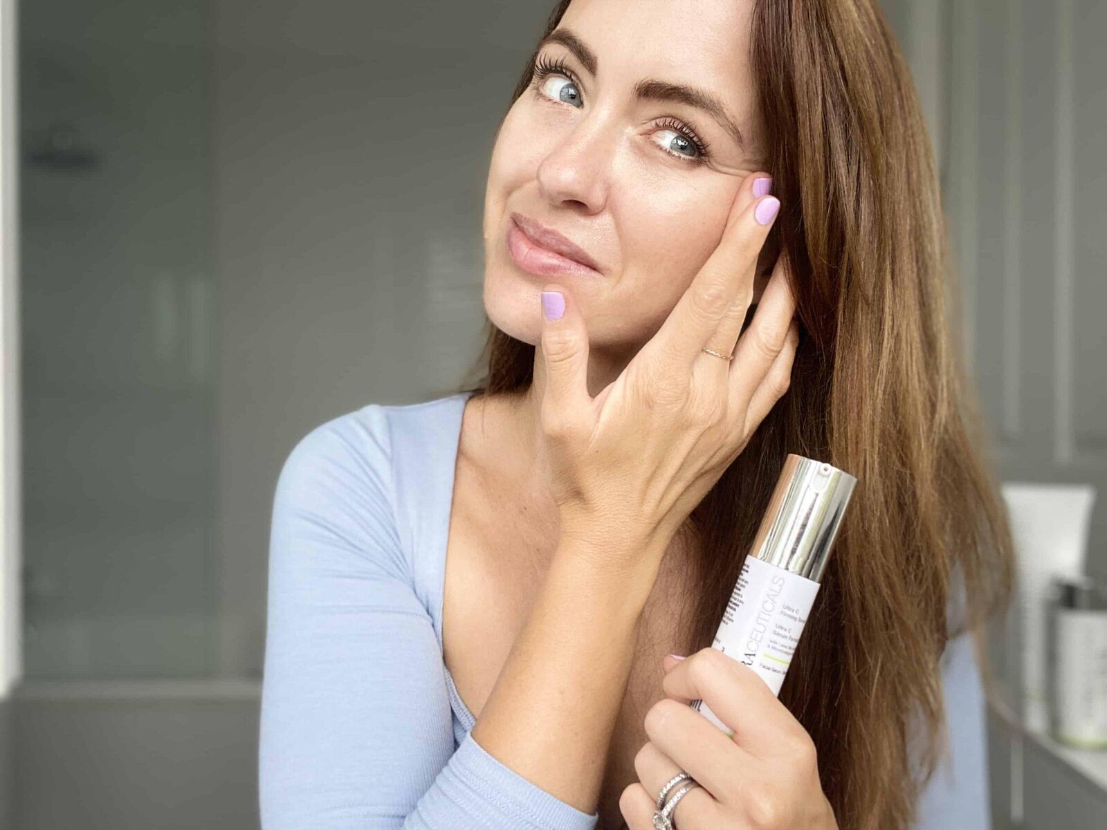 Woman receiving professional facial treatment with ultrasound technology at luxury skin clinic