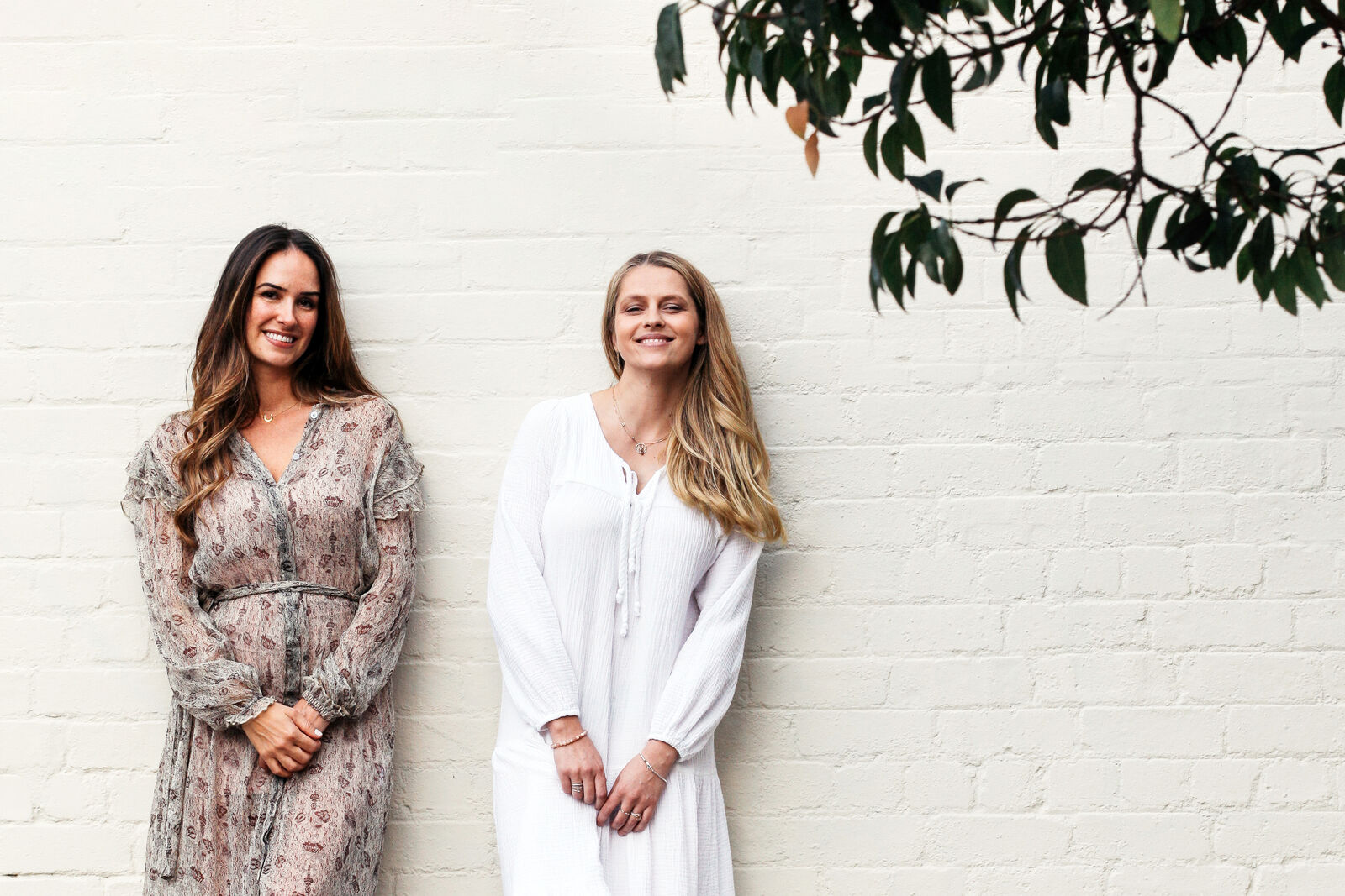 Teresa Palmer and Chrissy Duigan holding Lovewell supplement containers in Adelaide