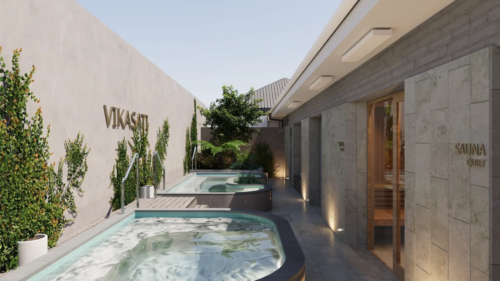 Outdoor plunge pools beside a stone-clad sauna and a vine-covered wall at Vikasati Bathhouse, Southport
