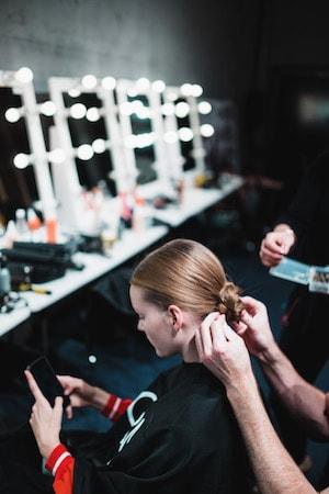 Perfect braided buns sewn into place at C/MEO