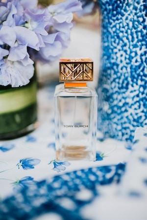 The Fragrance Bottle is Clean and Minimal with Gold Accents
