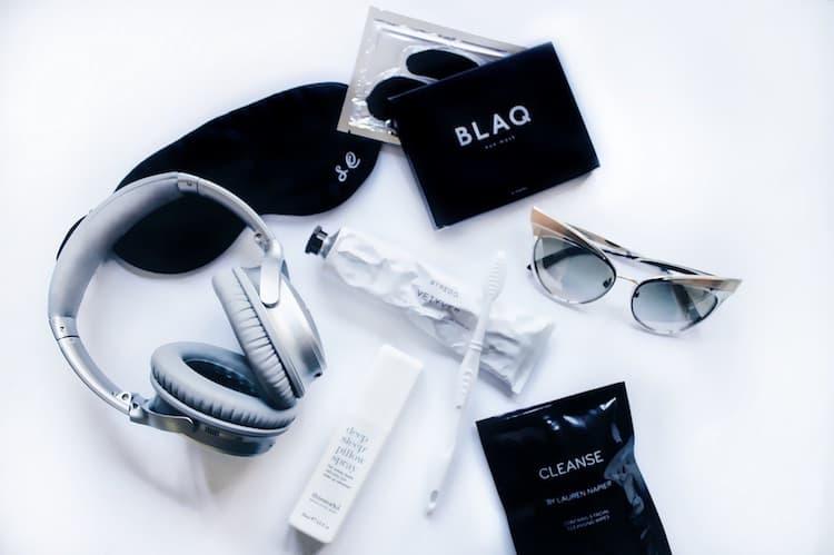Essentials: Eye Mask; Bose Wireless Headphones, Blaq Eye Mask, Cleanse Towels and Sunnies