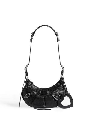 Balenciaga Le Cagole XS Shoulder Bag in black with punk-inspired studs and hardware