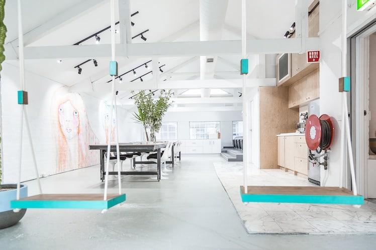 Minimalist salon interior with whitewashed walls at Edwards and Co Melbourne