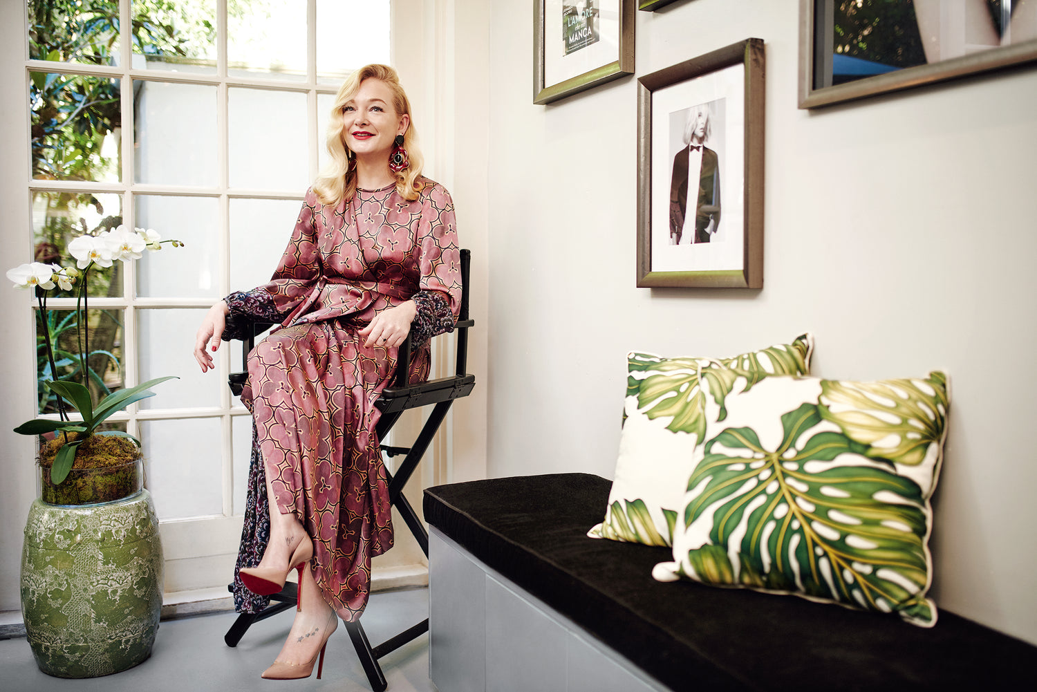 Belinda Jeffrey, "The Blonde Whisperer," seated in her Darlinghurst salon surrounded by framed editorial prints