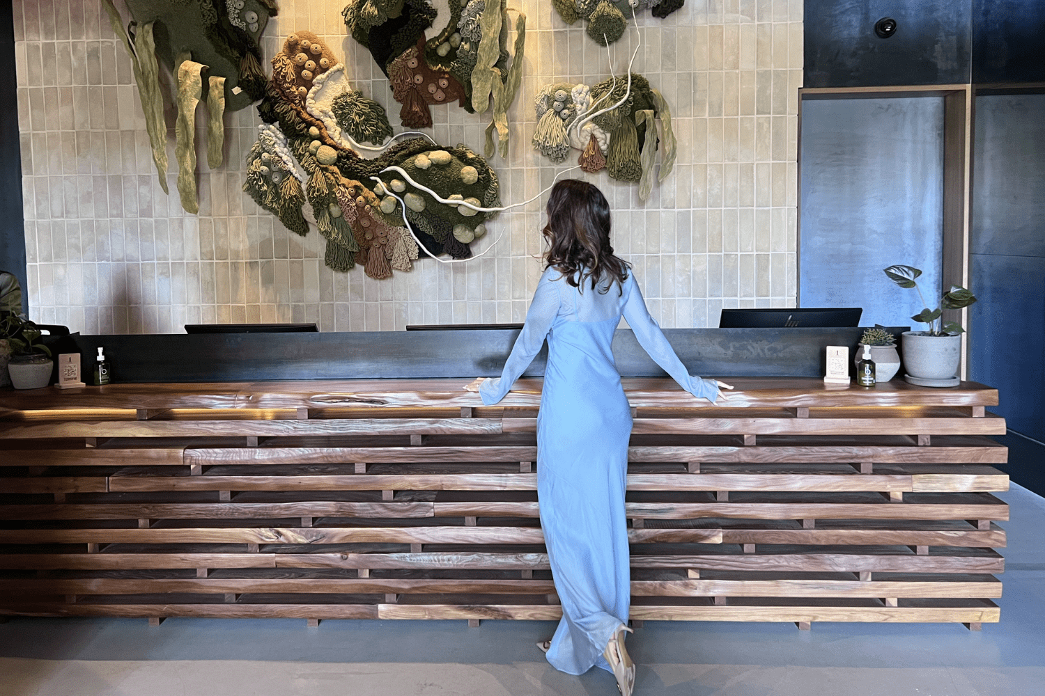 Guest room at 1 Hotel Melbourne with greenery, yoga mat and triple-filtered water tap