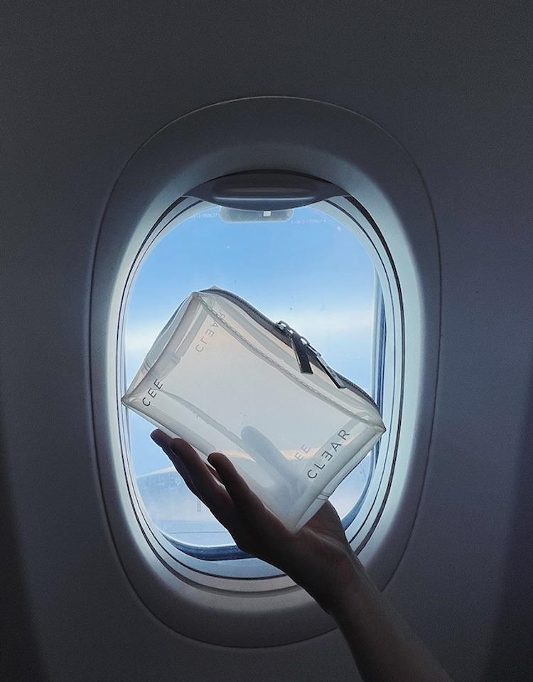 CEE CLEAR transparent cosmetics case packed with beauty products