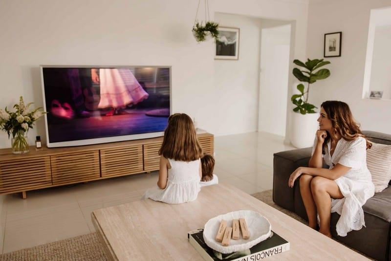 Sigourney in the living room with the Samsung The Serif in Ambient Mode