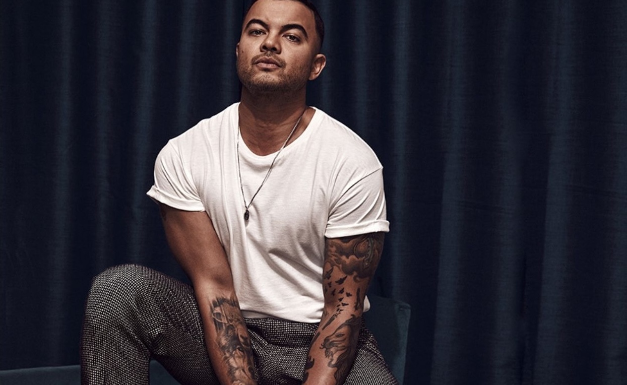 Guy Sebastian photographed against a dark backdrop for Beautiful Inside by Beauticate